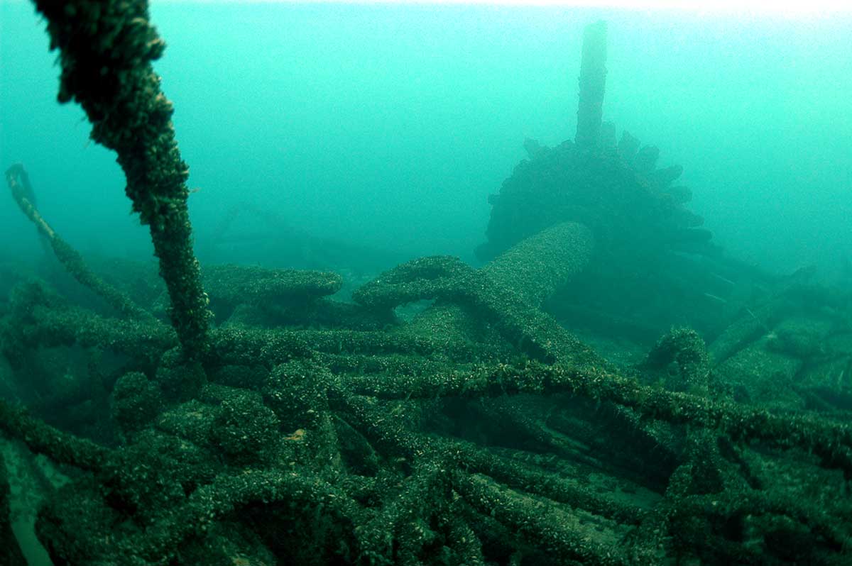 One of Niagara's paddle-wheels and drive shaft extending from the wreckage of the hull. Photo by WHS, Maritime Preservation and Archaeology Program, via Wisconsin Shipwrecks